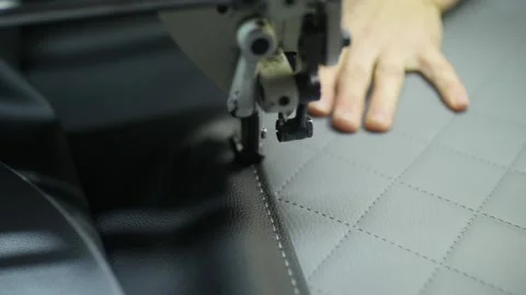 Seamstress sewing on a sewing machine Stock Footage 130710889