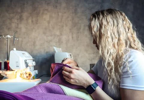 The seamstress at work in the studio Stock Photos