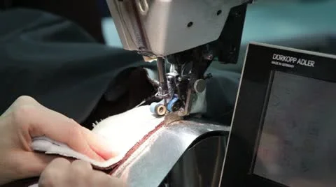Seamstress working on the sewing machine. Stock Footage 22142964