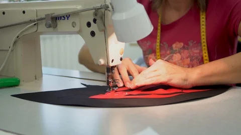 Seamstress working on a sewing machine Stock Footage 101378933