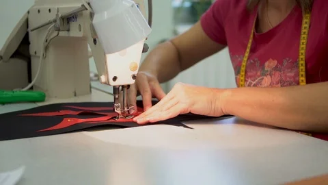 Seamstress working on a sewing machine Stock Footage 101379001