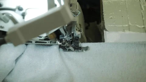 Seamstress working at the sewing machine Stock Footage 140908590