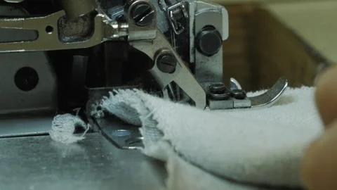 Seamstress working on a sewing machine Stock Footage 143204034