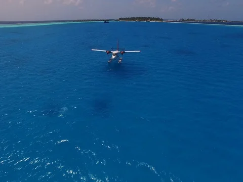 Seaplane on background water surface and horizon in Maldives. taking off Video stock 76719301