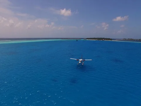 Seaplane on background water surface and horizon in Maldives. Pleasant journey Video stock 76719349