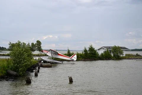 Seaplane docks at a pier Photos
