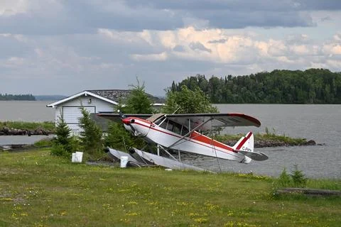 Seaplane docks at a pier Photos