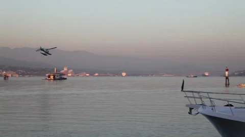 Seaplane landing - pan Stock Footage 30345503