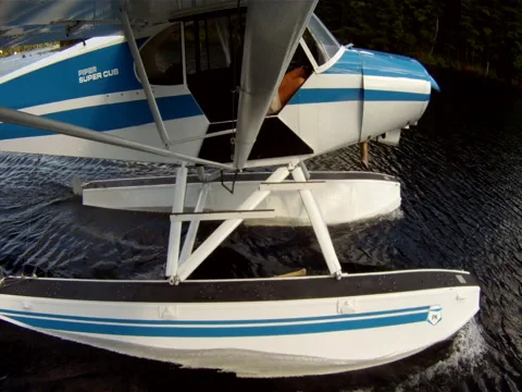 Seaplane mounted on wing strut 01 takeoff Stock Footage 50621996