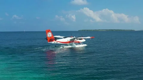 Seaplane or hydroplane is taking off or landing on a water on Maldivian. 20 Stock Footage 175734978