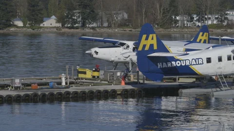Seaplane Pulling Away from Dock Stock Footage 147710080