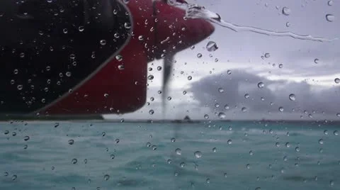 Seaplane take off on rainy day Stock Footage 17485040