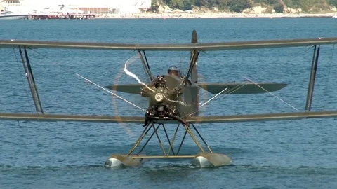 Seaplane U-2 / Po-2 (NATO: "Mule") floats on water like boat . Stock Footage 121169047