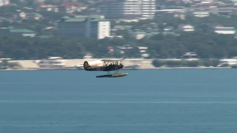 Seaplane U-2 / Po-2 (NATO: “Mule”)  accelerates and takes off. Stock Footage 123329225