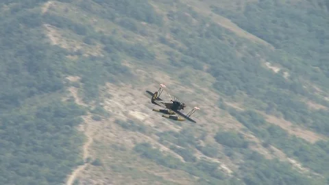 Seaplane U-2 / Po-2 (NATO: "Mule") performs aerobatics over Gelendzhik Bay. Stock Footage 123684478