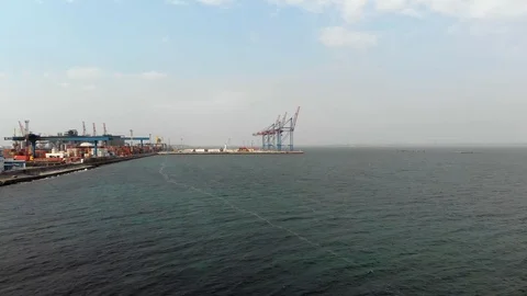 Seaport with containers and cranes Видео 105672955