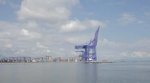 Seaport cranes viewed by the sea 스톡 동영상 50922641