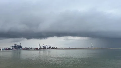 Seaport on the seashore and a storm cloud. Stock Footage 245386985