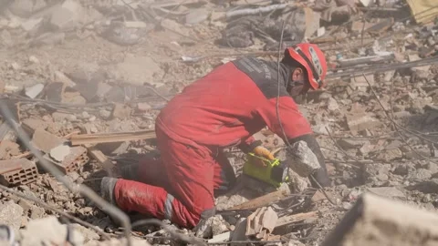 Search and Rescue Teams at Work After Earthquake, February 8, 2023, Hatay, Video stock 336521639