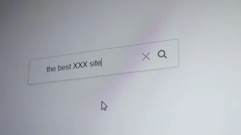 A search bar with the entering query The best free XXX sites Stock Footage 296971774