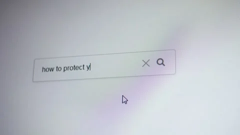 A search bar with the entering query How to protect yourself from COVID Stock Footage 297501493