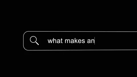 Search bar typing question - What makes an NFT valuable? on a black background. Stock Footage 195219504