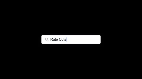 Search bar typing "rate cuts" text for financial market analysis and econom.. Stock Footage 337552698