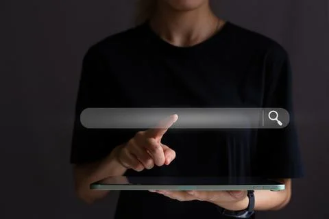 Search button on virtual screen pressed with finger, Concept for promoting ra Stock Photos