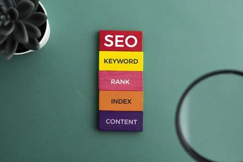 Search Engine Optimization concept. Blocks with words SEO, keyword, rank, i.. Stock Photos