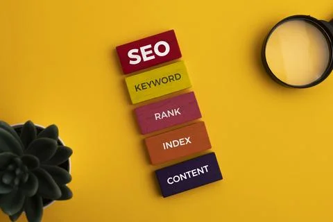 Search Engine Optimization concept. Blocks with words SEO, keyword, rank, i.. Stock Photos
