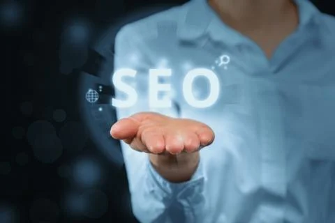 Search engine optimization concept with the girl holds a digital display Stock Photos