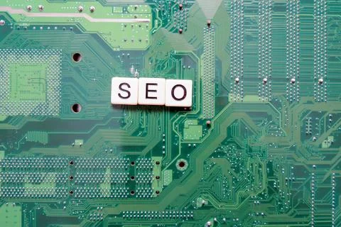 Search Engine Optimization concept with letters SEO spelled out on computer Stock Photos