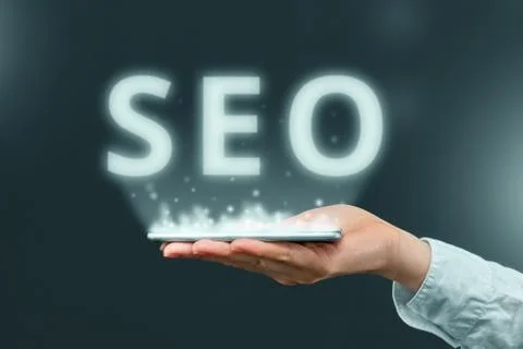 Search engine optimization concept over smartphone in hand of businessman Stock Photos