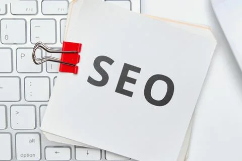 Search engine optimization on paper sticker as a sticky note Stock Photos