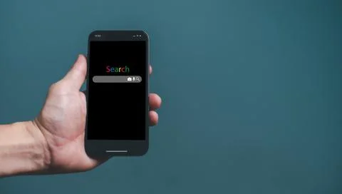 Search Engine Optimization SEO Networking Concept, Hand of businessman holdin Stock Photos