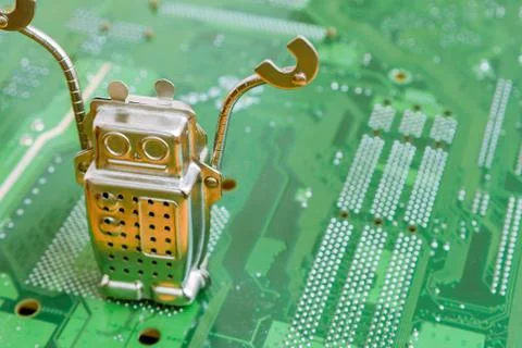 Search engine robot is looking for the best online website metaphor with toy  库存照片