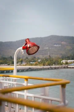 Search light attached to the side of a ship. Stock Photos