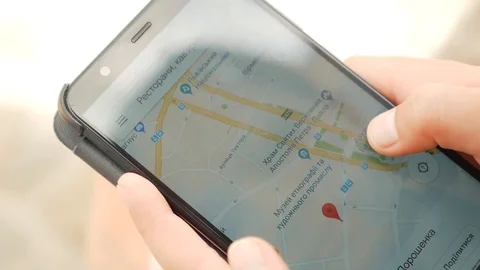 Search Maps on your phone Stock Footage 92207365