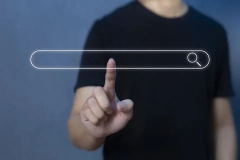 Search technology, search engine optimization, man's hand using virtual to se Stock Photos