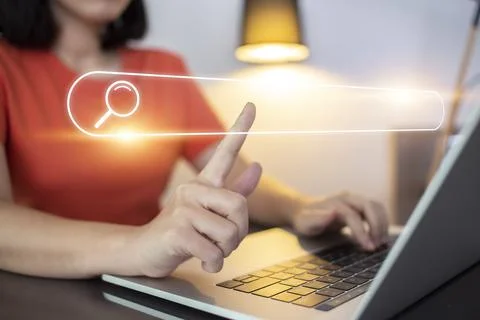 Search technology, search engine optimization,person using laptop to search i Stock Photos