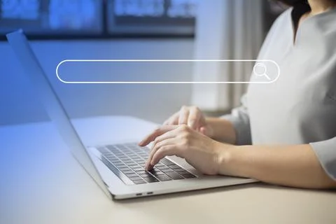 Search technology, search engine optimization,person using laptop to search i Stock Photos