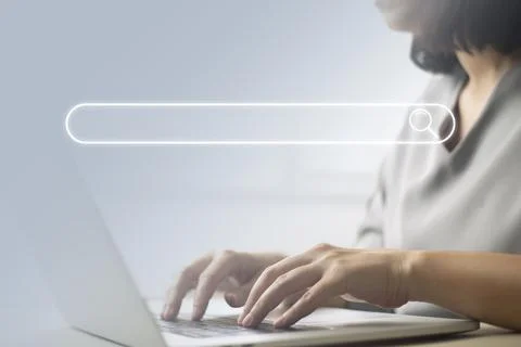 Search technology, search engine optimization,person using laptop to search i Stock Photos