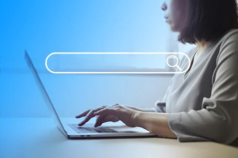 Search technology, search engine optimization,person using laptop to search i Stock Photos