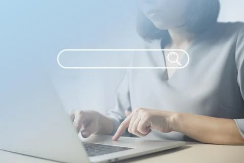 Search technology, search engine optimization,person using laptop to search i Stock Photos