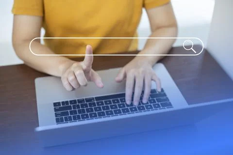 Search technology, search engine optimization,person using laptop to search i Stock Photos