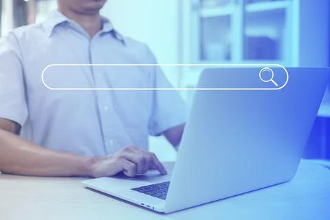 Search technology, search engine optimization,person using laptop to search i Stock Photos