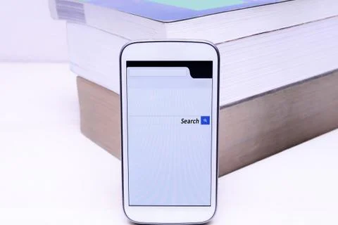 Search on the web with smartphone Stock Photos