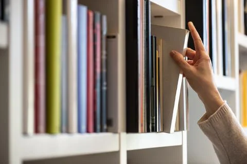 Searching for a book Stock Photos
