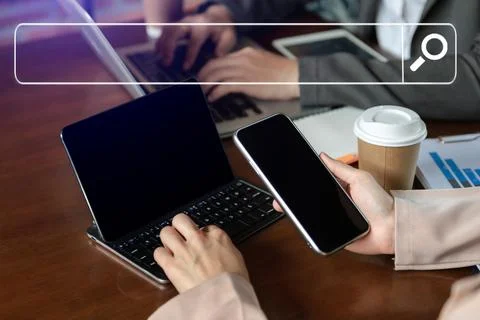 Searching Browsing Internet Data Information with blank search bar.business w Stock Photos