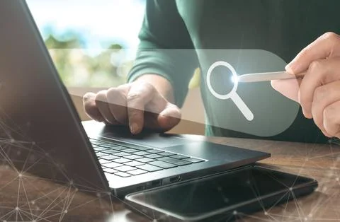 Searching Browsing Internet Data Information with blank search bar. Data rese Stock Photos